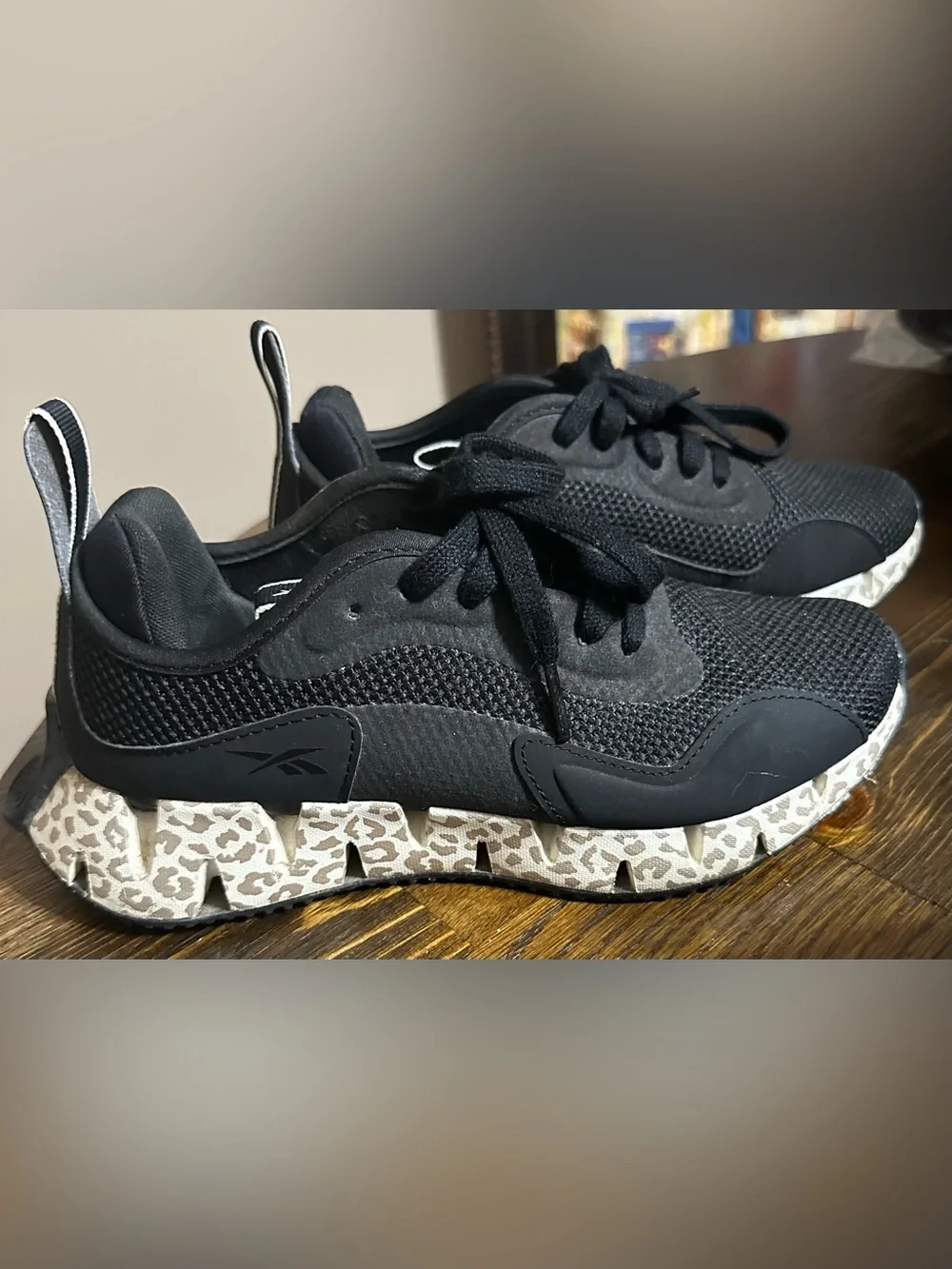 Reebok Black Athletic Sneakers with Leopard-Print Sole